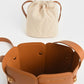 Charles & Keith Studded Drawstring Bucket Bag - Cognac